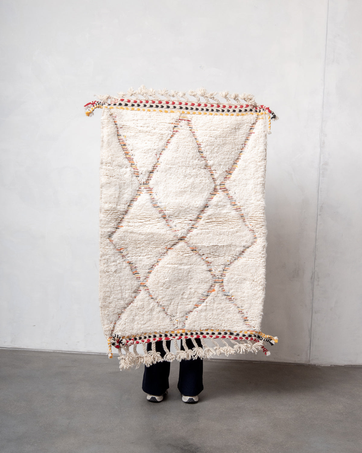 Modern, designer, handcrafted Berber rug from Morocco. Beniourain carpet with beautiful colours and patterns and fluffy wool texture.